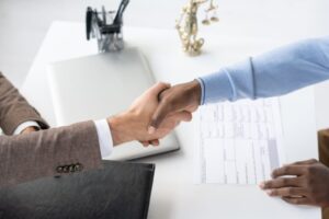 handshaking with lawyer 2021 12 09 15 13 53 utc 1 min 1030x687 1