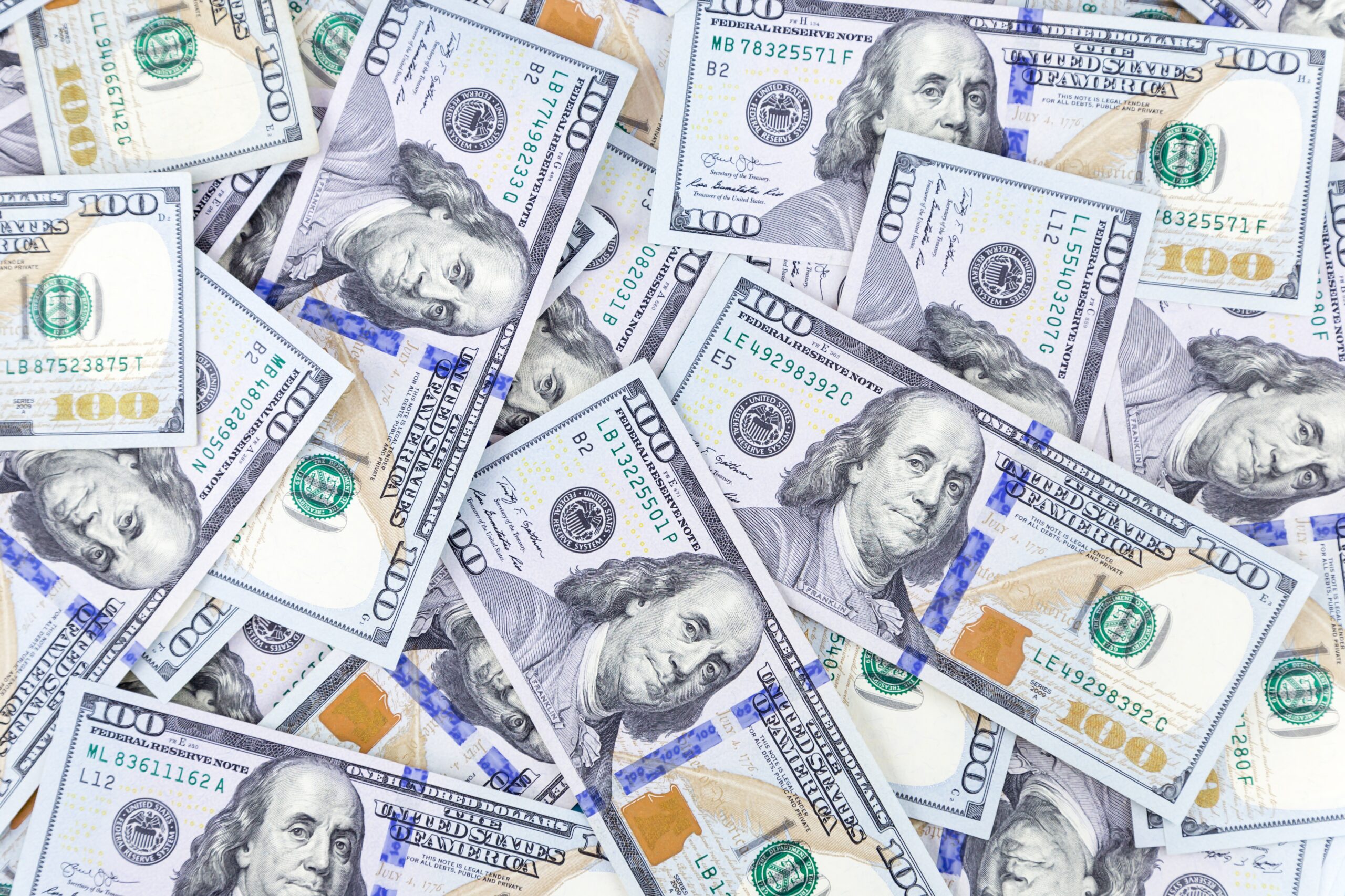 Incentivos fiscales en Área Económica Especial Panama Pacífico, Zonas Francas y Sede de Empresas Multinacionales 1 top view of dollars scattered on the desk nobody 2023 11 27 05 03 23 utc scaled